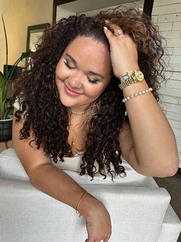 curly hair extensions client photo jacksonville, fl